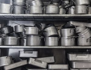 Shelf Flooded with Pots and Pans