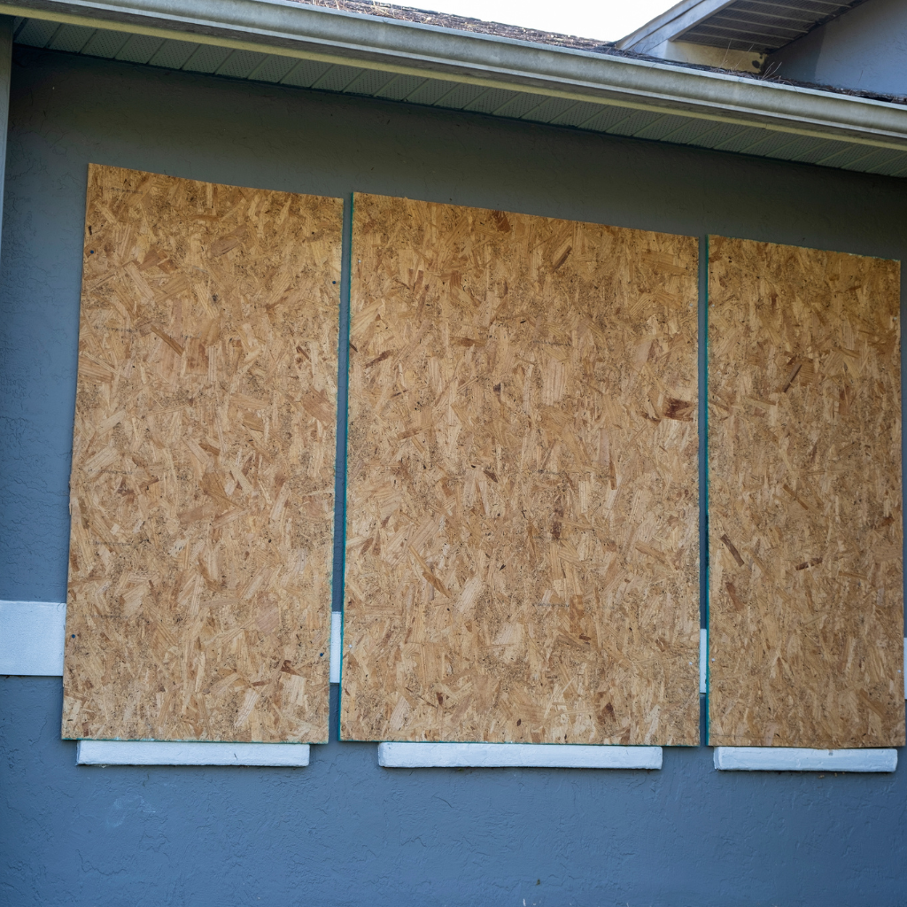 Emergency board-up service in Las Vegas securing broken windows after storm damage